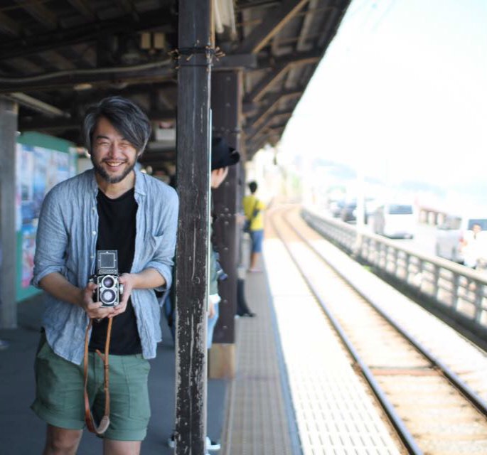 フォトグラファーの大森崇史さんのポートレート